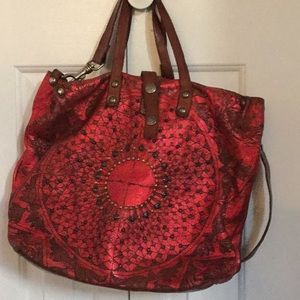 Red embellished made in Italy handbag